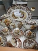 A 17 pieces of Royal Worcester Palissy game bird tea ware including cups, saucers, teapot,