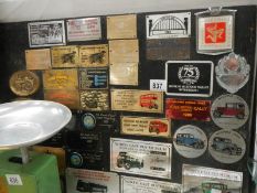 A collection of brass badges and plates from Steam fairs etc