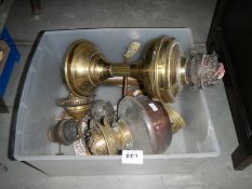 A quantity of oil lamp burners and lamps etc