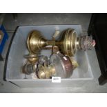 A quantity of oil lamp burners and lamps etc