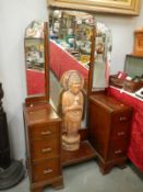 A dressing table with 3 mirrors