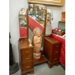 A dressing table with 3 mirrors