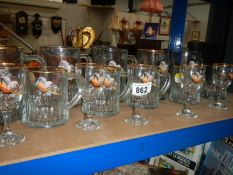 A collection of glasses featuring a pheasant motif