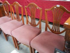 A set of 4 shield back mahogany chairs