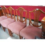 A set of 4 shield back mahogany chairs