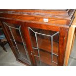 A leaded 2 door cabinet