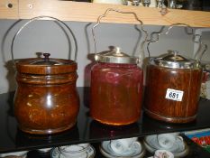 2 old wooden biscuit barrels and a Cranberry example