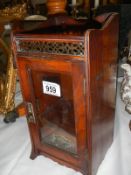 An old oak smokers cabinet