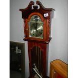 A small grandfather clock