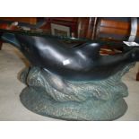 An oval dolphin table