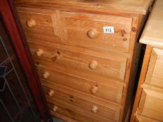 A pine 2 over 3 chest of drawers