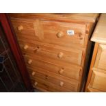 A pine 2 over 3 chest of drawers