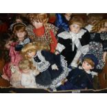 A quantity of collectable dolls