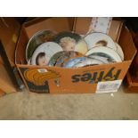 A box of collectors plates