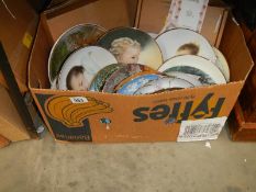 A box of collectors plates