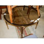 A round brass framed table