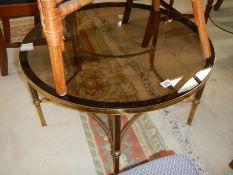 A round brass framed table