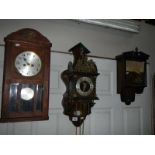 A 1930's oak wall clock and 2 others