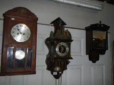 A 1930's oak wall clock and 2 others