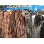 A quantity of faux fur coats