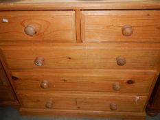 A 2 over 3 pine chest of drawers