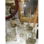 A selection of cruet stands, bottles etc.