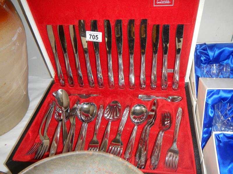 A boxed set of Oneida cutlery