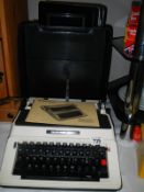 A vintage Antler briefcase and a vintage Silver Reed 500 typewriter
