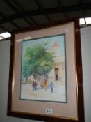 A good framed and glazed watercolour of a Street Scene