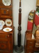 A mahogany 4 poster post lamp