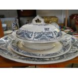 A lidded tureen with two graduated platters (largest approximately 18 x 4.