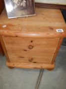 An old pine 2 drawer chest