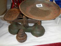 A set of old scales with weights