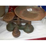 A set of old scales with weights