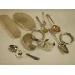 A mixed lot of silver lids for glass bottles etc., silver spoons etc.