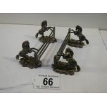 An unusual pair of pewter knife rests being horses jumping fences.