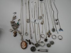 A mixed lot of jewellery including silver necklaces, dress rings, earrings etc.