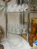 A cut glass bowl and 2 sets of six cut glass drinking glasses in good condition.