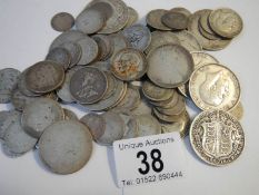 Approximately 340 grams of pre 1920 British silver coins.