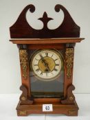 A late Victorian mantel clock in working order.