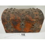 An early Victorian hide covered dome topped glove box with copper mounts, hide a/f.