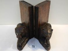 A pair of Black Forest book ends, 7.5" tall.