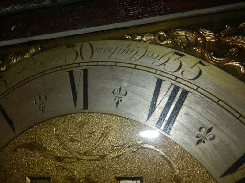 A heavily carved 8 day brass faced Grandfather clock by Geo. Raphams, Brigg. - Image 7 of 7