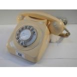 An old cream telephone converted for use.
