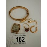 A mixed lot of gold items including ruby ring, earrings etc.