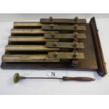 An unusual brass 5 key xylophone with brass bell tubes,