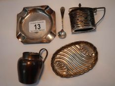 A silver mustard pot with spoons, a Silver pin dish,