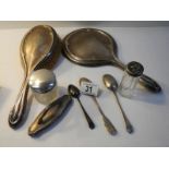 A silver dressing table set and 3 silver spoons (8 items in total).