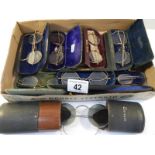 8 pairs of vintage spectacles in cases, possibly some gold but none marked.