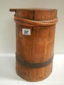 A Victorian wooden storage barrel with cover